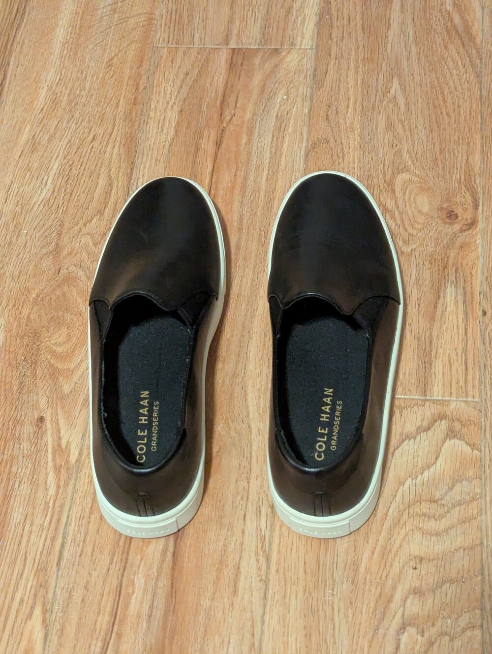 Cole Haan Black Slip-On Loafers with White Sole